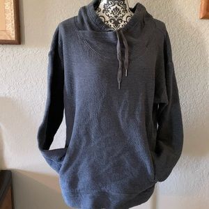 Gray pull over sweatshirt.